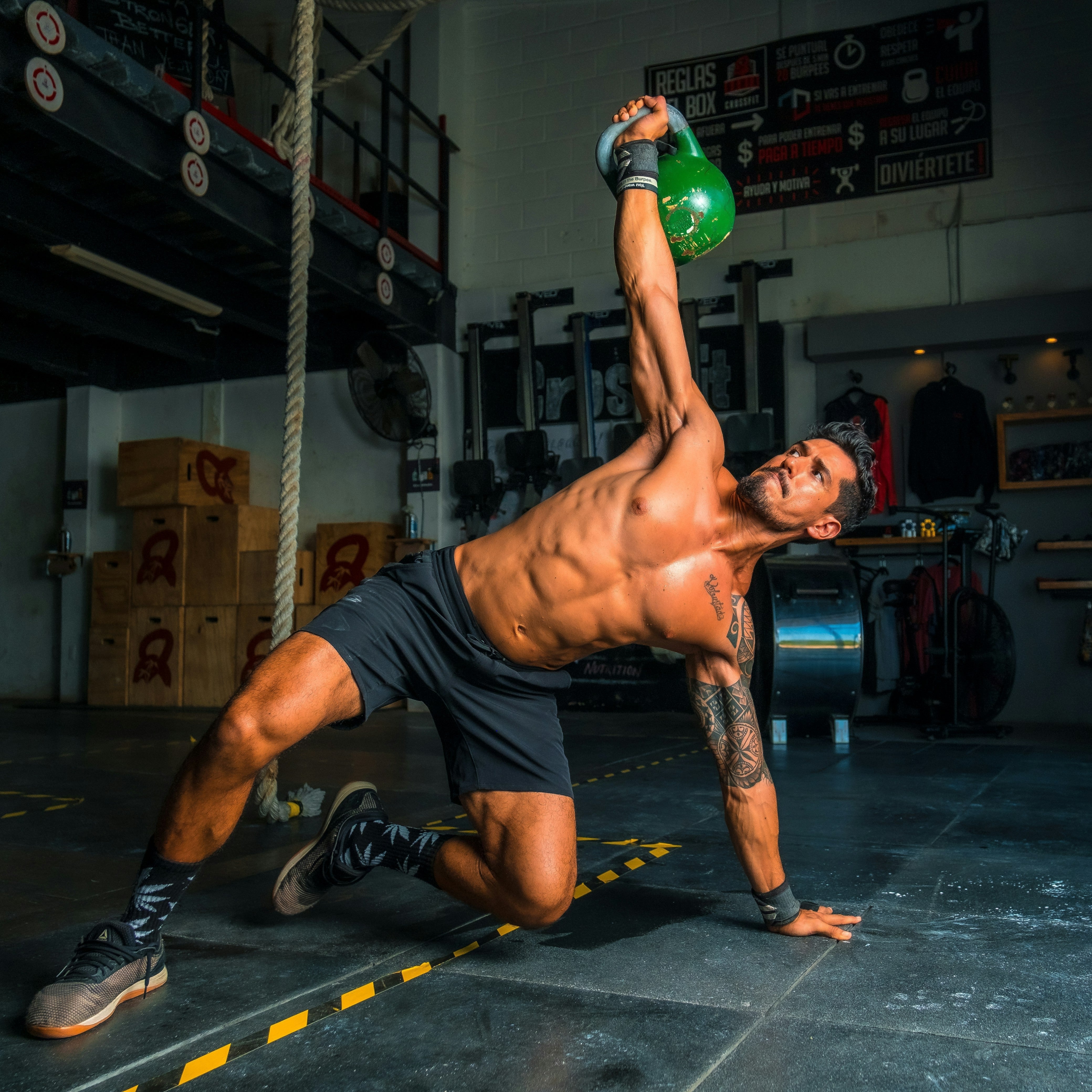 Amino Acids for Recovery | CanadianVit: An athlete performing a kettlebell workout, enhancing muscle recovery.