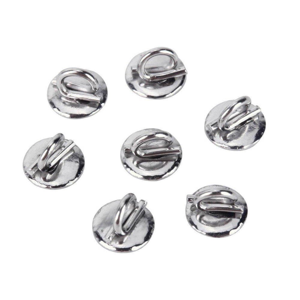 Lingual orthodontic buttons bonded to teeth close-up