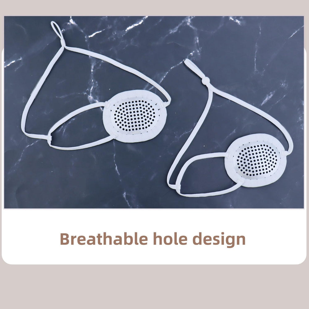 Ventilated convex eye shield with adjustable head strap, front view
