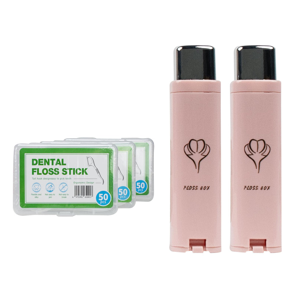 Two pink portable dental floss dispensers