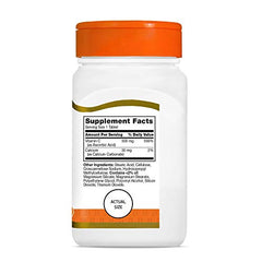 Vitamin C supplement bottle on white background