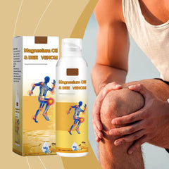 Hands applying magnesium oil joint spray to skin