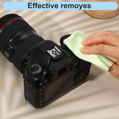 Cloths being used to clean eyeglasses and phone screens