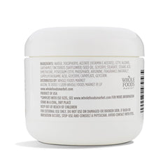Applying 365 Vitamin E Cream to skin for deep, lasting moisture.