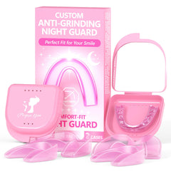 Pack of four pink night guards for teeth grinding and clenching