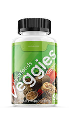 Capsules with fruits and vegetables background
