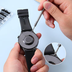 Repair kit in use on electronics, glasses, laptop and jewelry