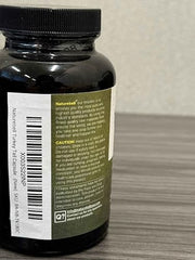 Close-up of capsules showing 600mg per serving (25:1 extract)