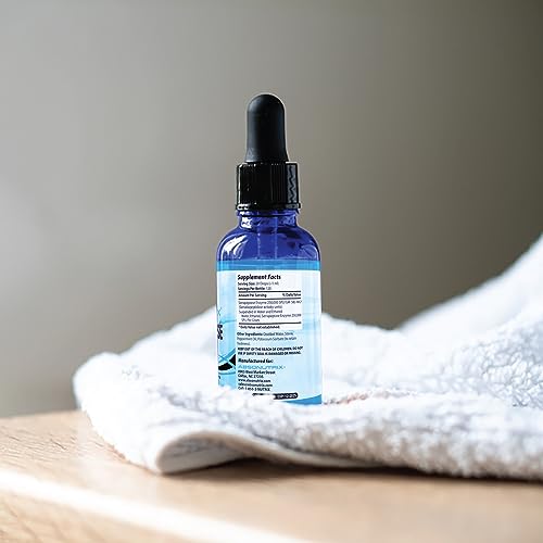 Dropper dispensing liquid Serrapeptase enzyme