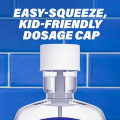 Pouring ACT Kids Simply Strawberry Mouthwash into a cup