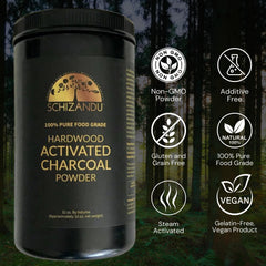 Close-up of fine, black activated hardwood charcoal powder