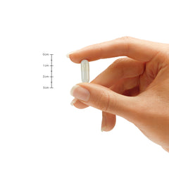 Smiling person after a comfortable meal