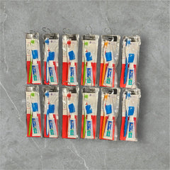 Each kit includes toothbrush with cap, toothpaste, and reusable bag