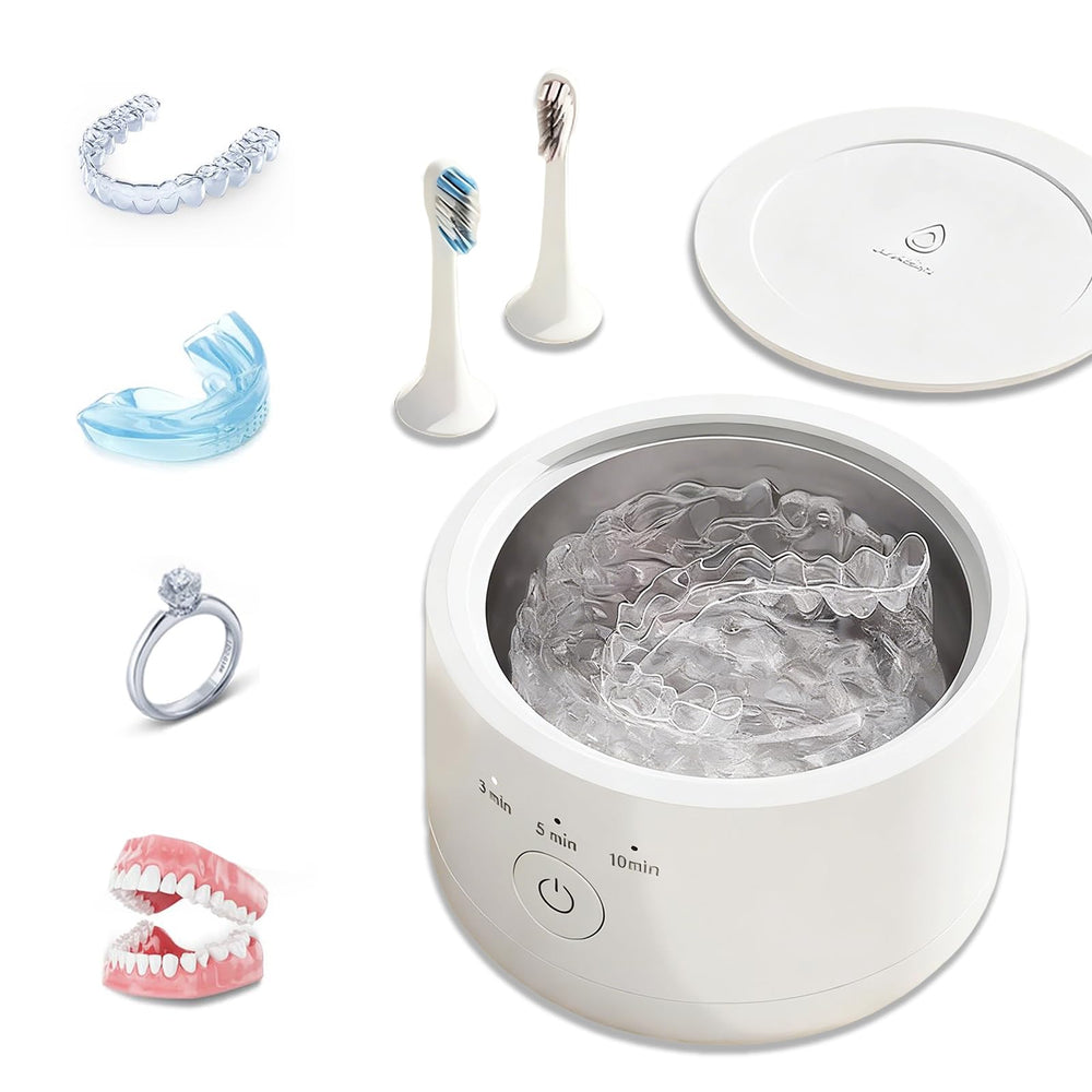 AIMEMD ultrasonic denture cleaner device with 200ml tank on countertop