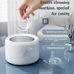 Front view of AIMEMD cleaner showing 200ml tank and compact design