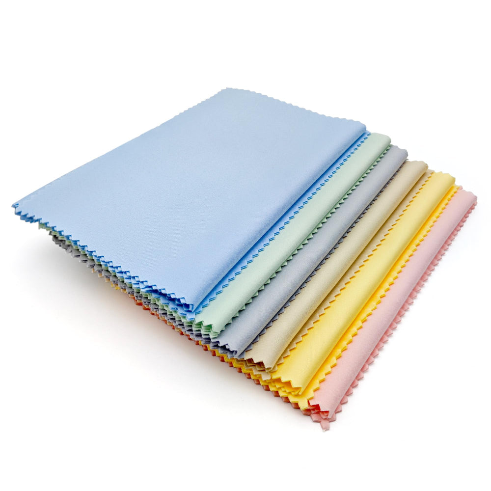 Close-up of AIMI microfiber cloths showing soft texture and colors