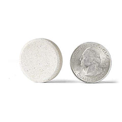 Airborne berry tablet dissolving in cup