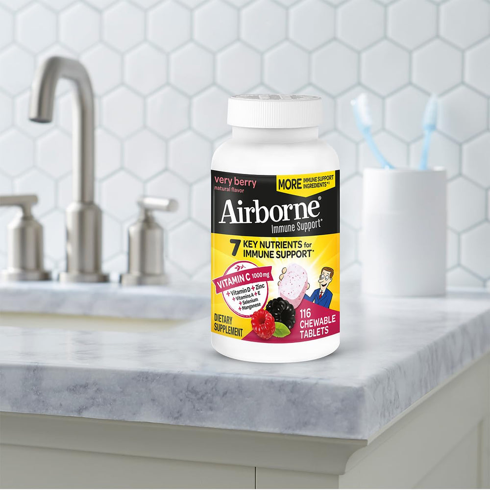 Adult taking Airborne chewables on the go