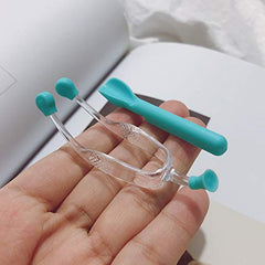 Green insertion tool with tweezers for contact lenses