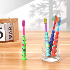 Kids toothbrush featuring a suction cup design