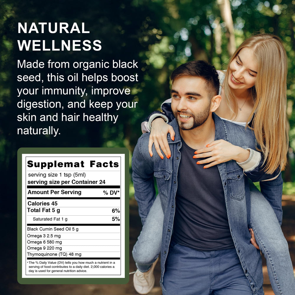 Applying AL-TAQWA Black Seed Oil to hair or skin