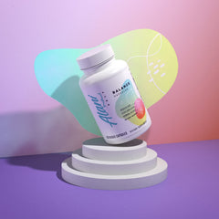 Capsules displayed next to the Alani Nu Hormonal Balance bottle