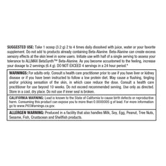 Scoop of Beta-Alanine powder next to container