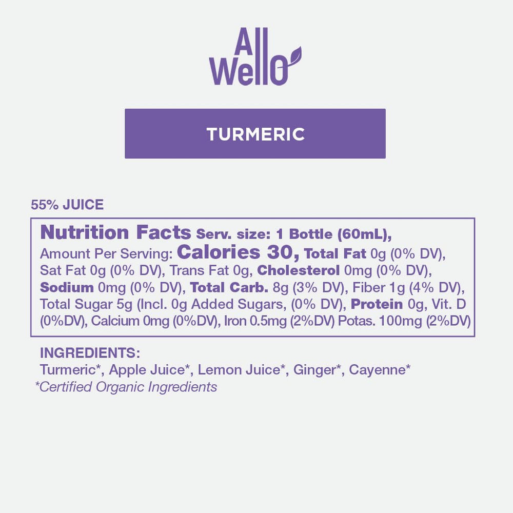 Close-up of ingredients: ginger, lemon, apple juice, cayenne