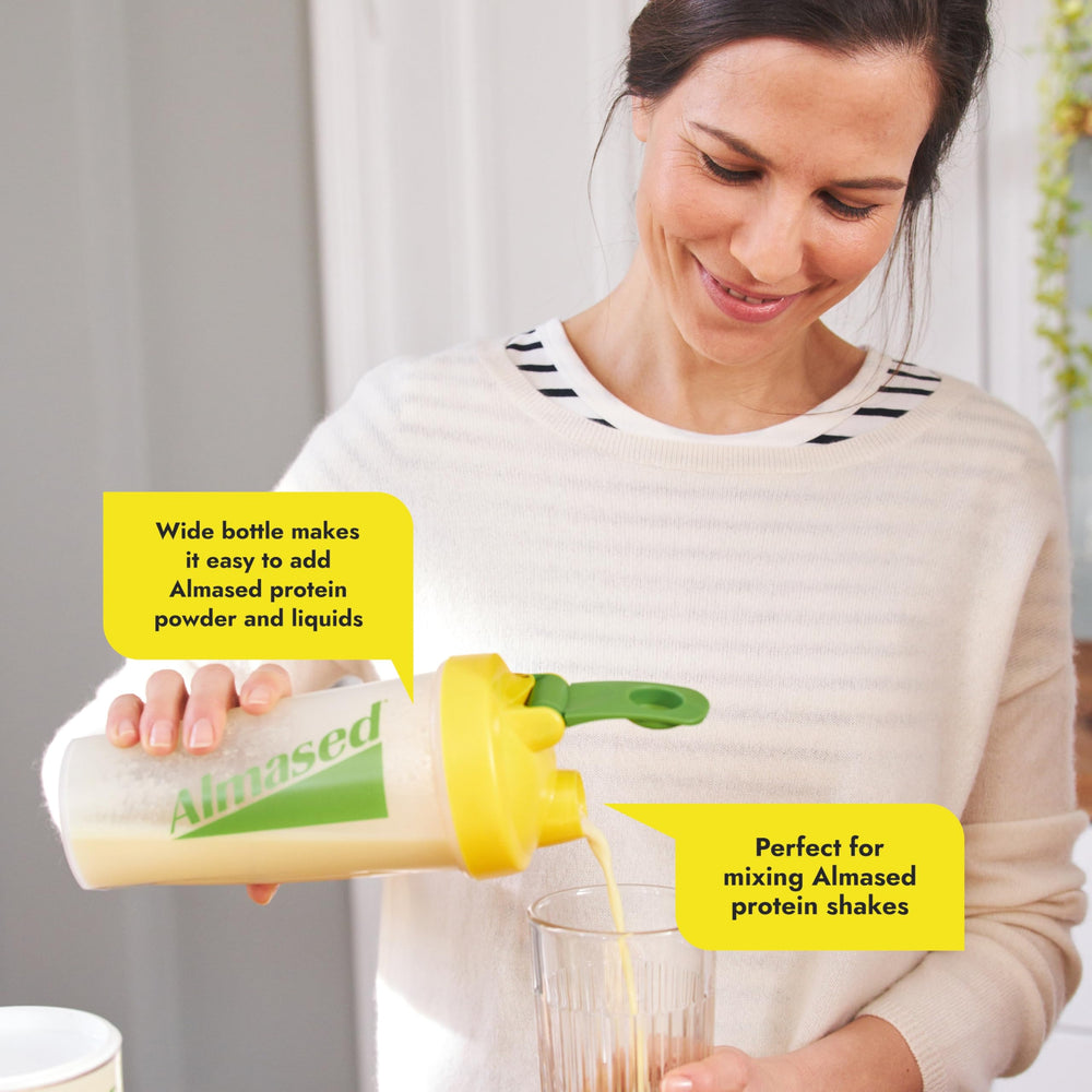 Almased Protein Shaker Bottle ergonomic hold improves grip for comfortable workouts.