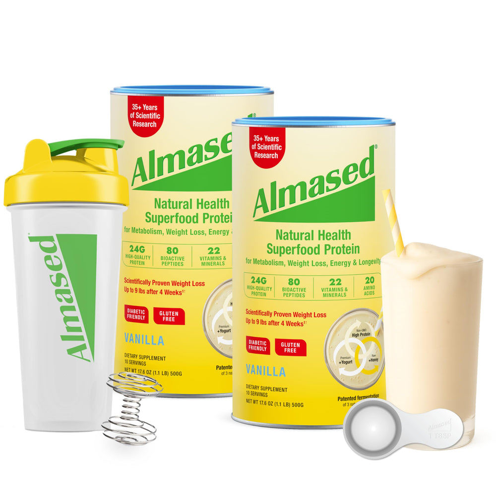 Almased starter kit almond vanilla cans on table, convenient protein-packed meal replacement.