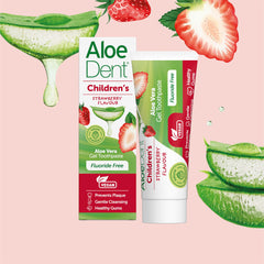 Child brushing teeth with AloeDent Strawberry toothpaste