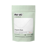 Scoop of Amy Myers MD Organic Reds Superfood Powder with beet root and berries