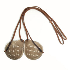 Package contents: two dark eye shields with straps