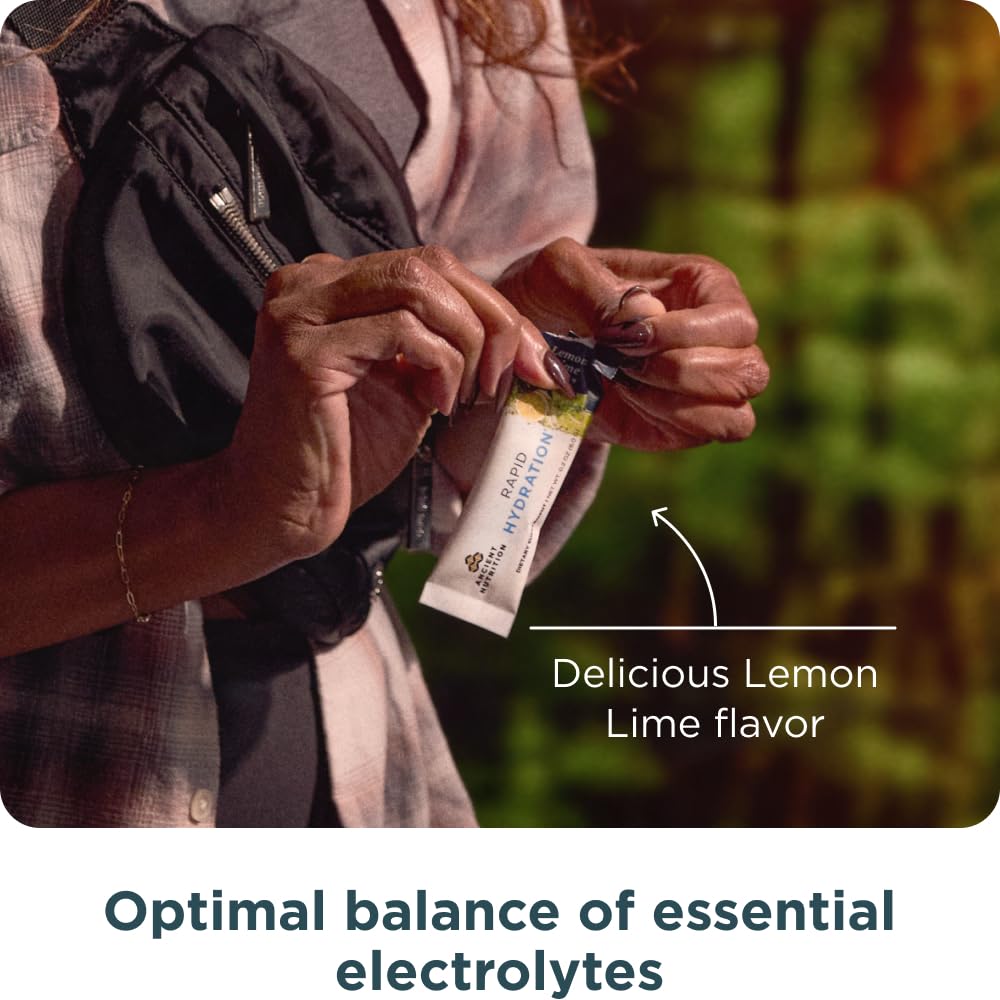 Ancient Nutrition Rapid Hydration tub with powder and measuring scoop ready to mix