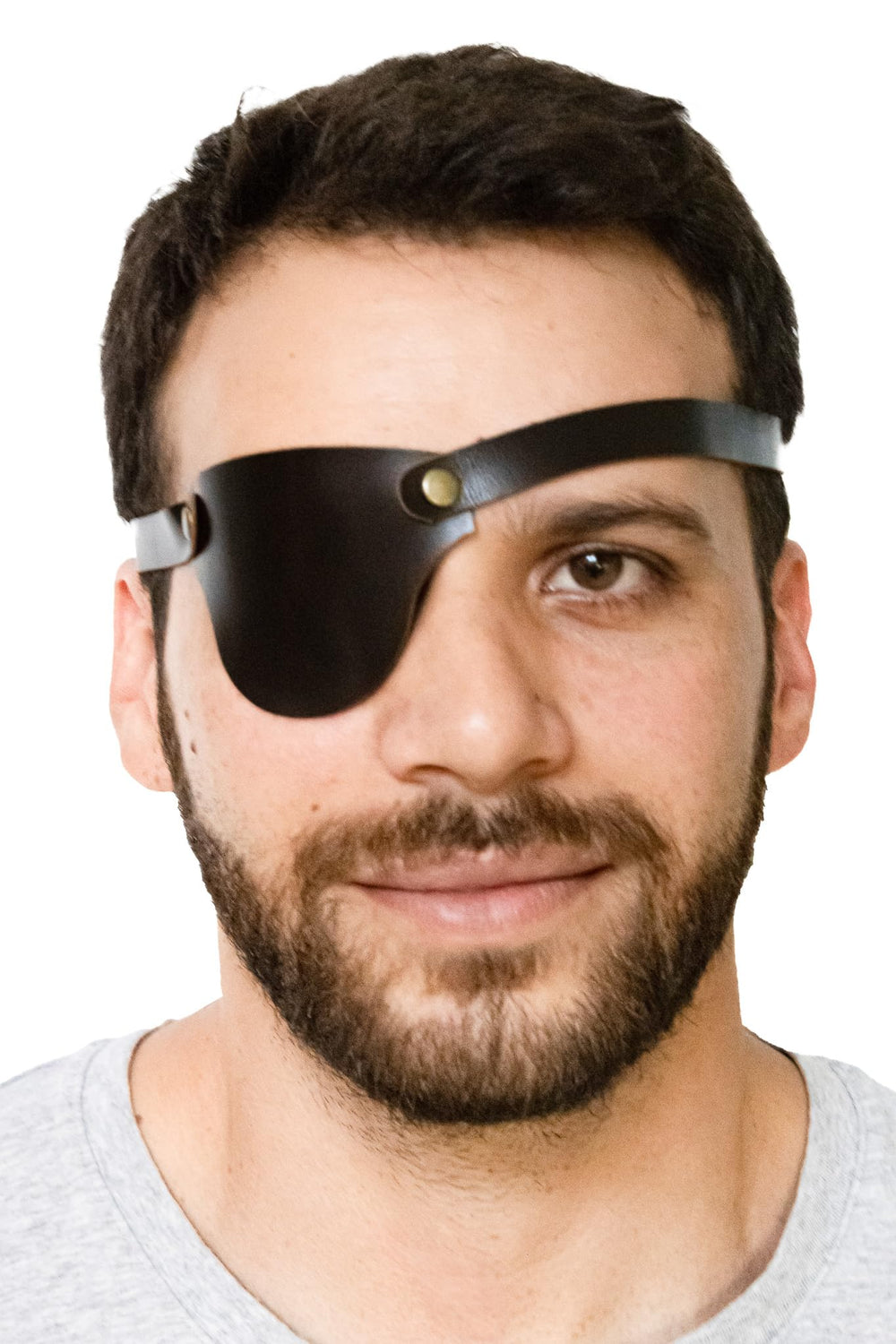 Close-up of adjustable strap on leather eye patch