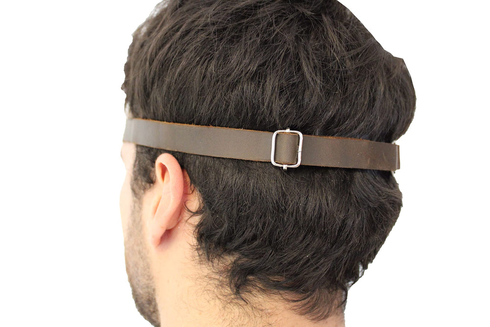 Sleek black leather eye patch with comfortable fit