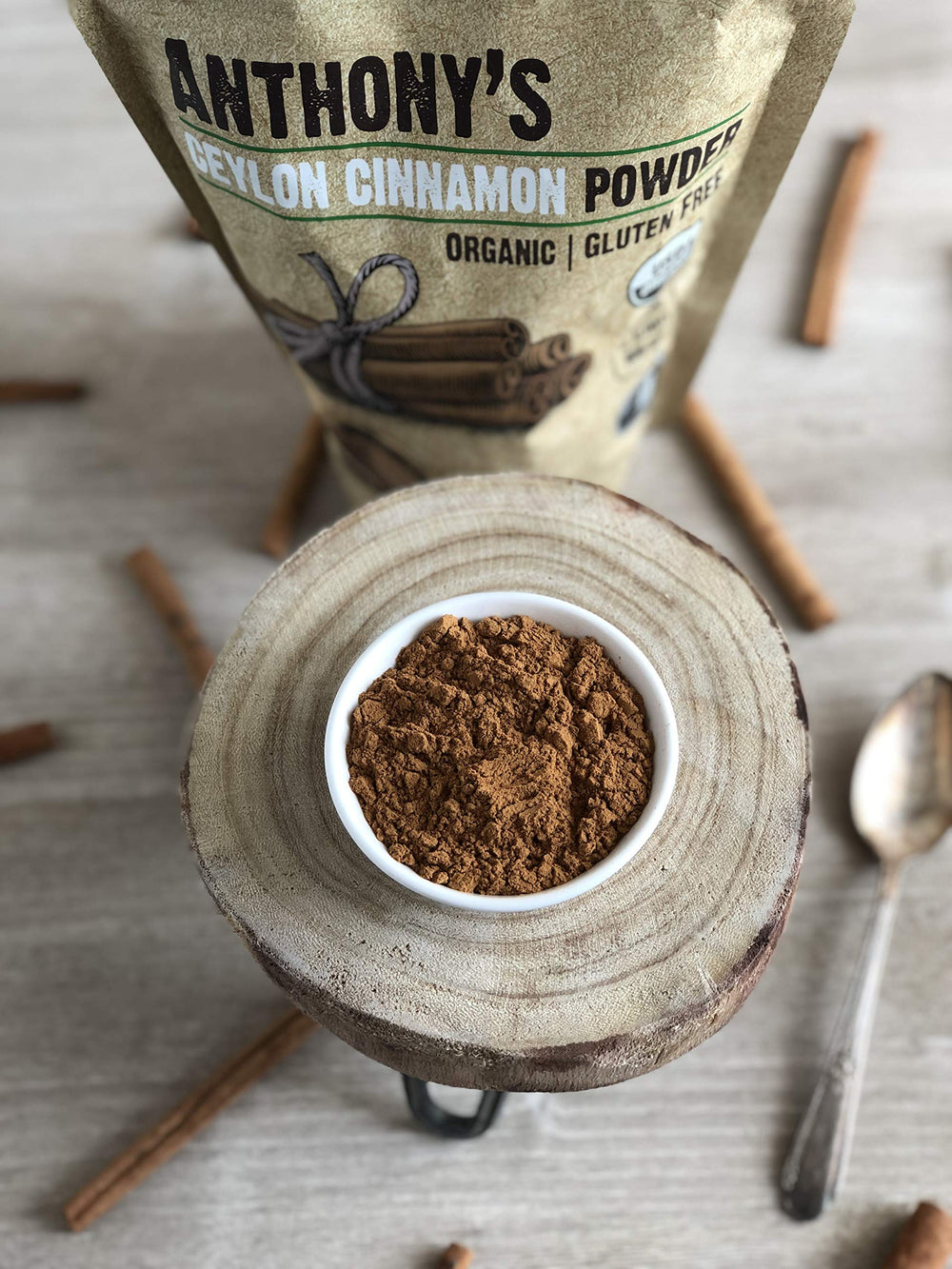 Anthony's Organic Ceylon Cinnamon Powder in a spice rack display.