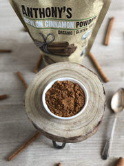 Anthony's Organic Ceylon Cinnamon Powder in a spice rack display.
