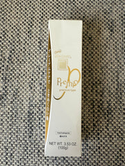 Close-up of APAGARD Premio toothpaste tubes