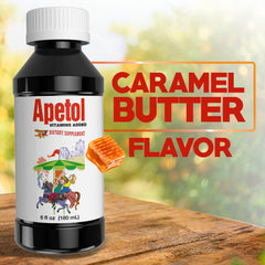 Poured Apetol liquid supplement beside a glass of water