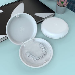 Open case with aligners stored securely