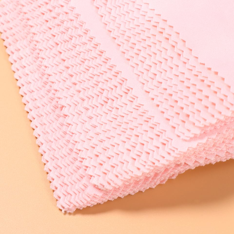 Camera lens cleaned by microfiber cloth
