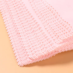 Camera lens cleaned by microfiber cloth