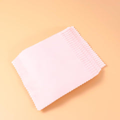 Compact set of pink microfiber cleaning cloths
