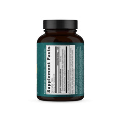 Daily-use bottle of Ashwagandha tablets with glass of water