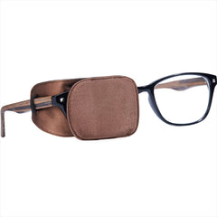 Astropic Silk Eye Patch in brown worn over glasses (medium)