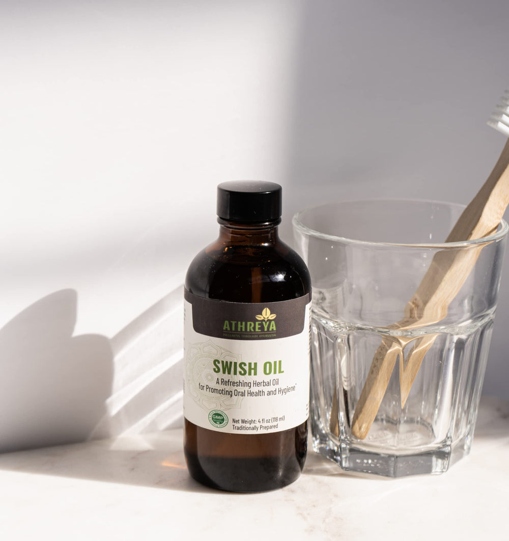 Lifestyle shot of Swish Oil with fresh breath context