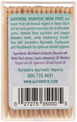 Close-up of neem-infused birchwood toothpick