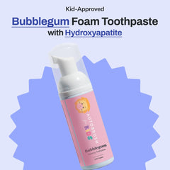 Close-up of dispensing autobrush foaming toothpaste for kids bubblegum flavor