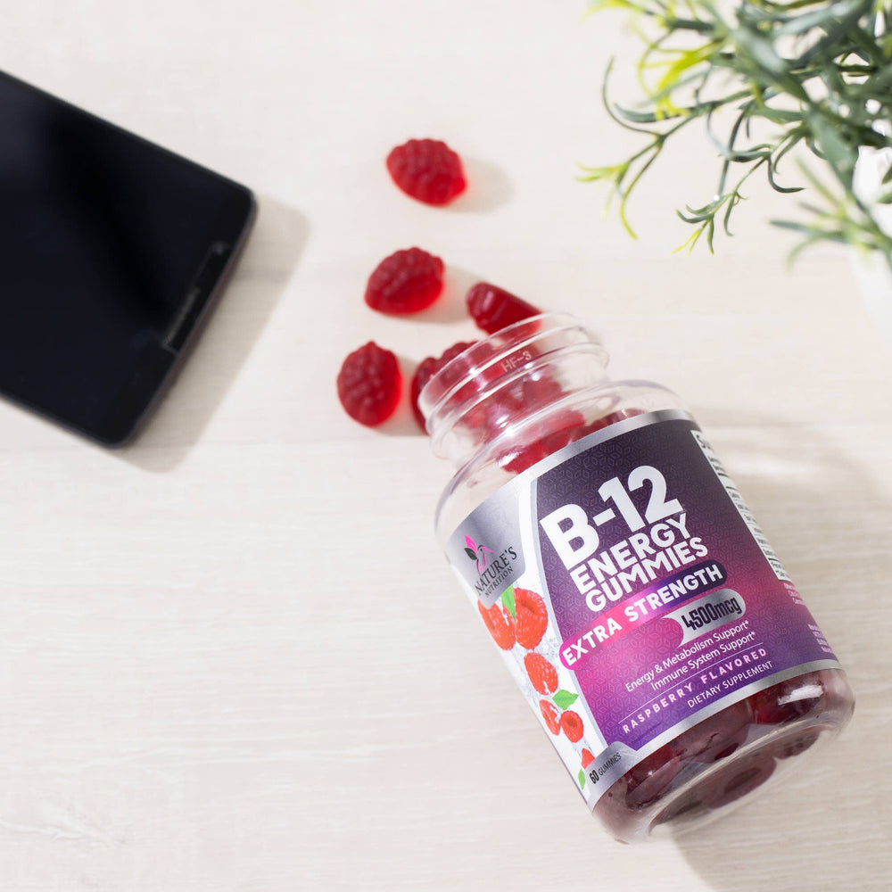 Berry-flavored B-12 gummies with natural backdrop